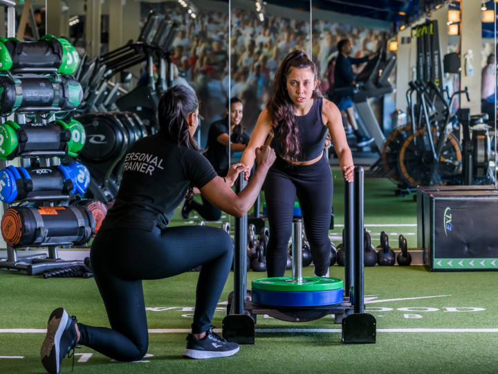 Personal trainer with client at Dublin personal training studio