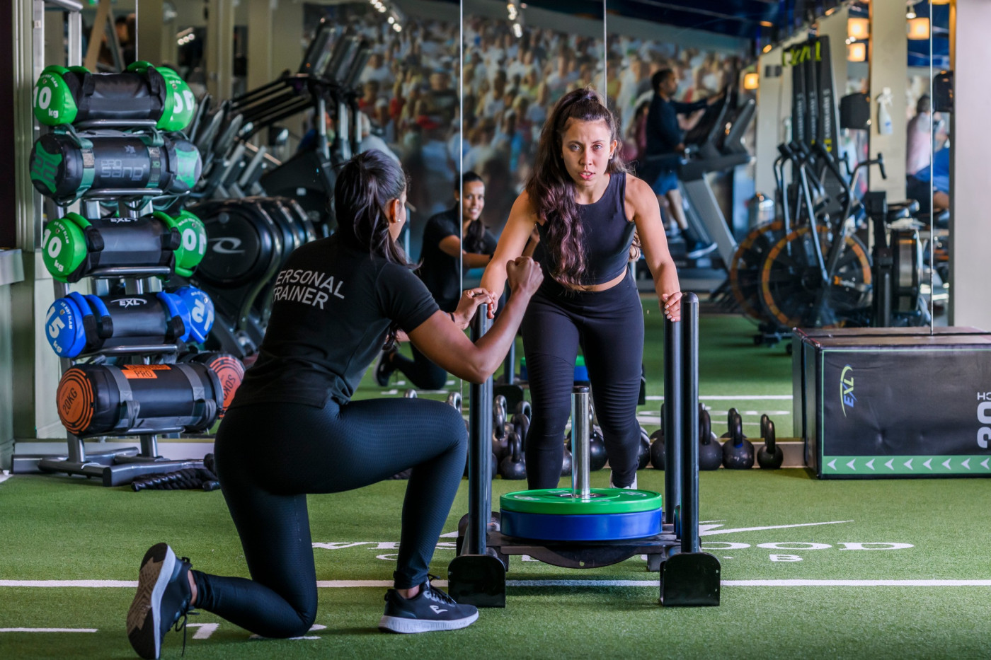 Personal trainer with client at Dublin personal training studio