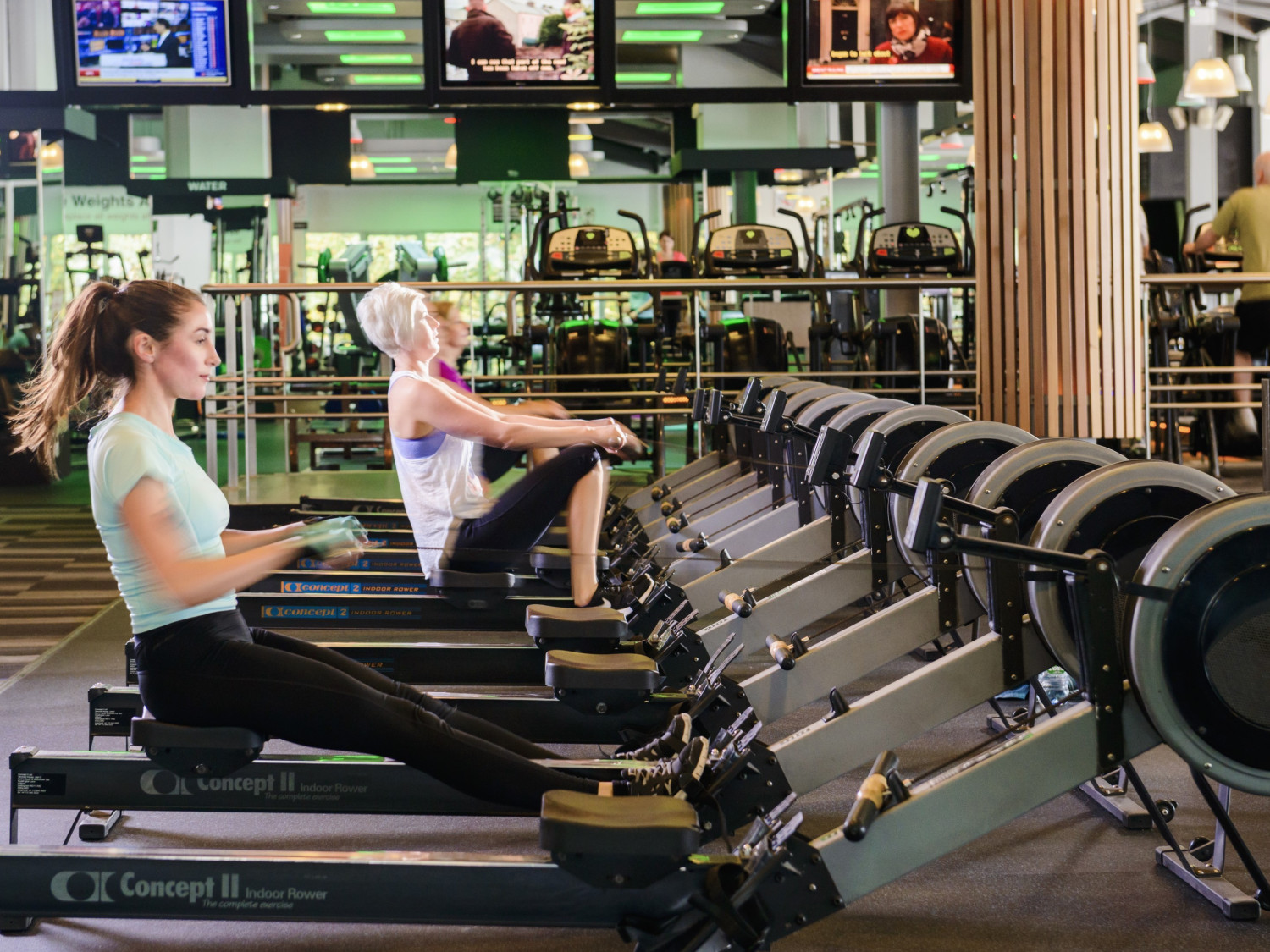 girls on rowers in Dublin gym