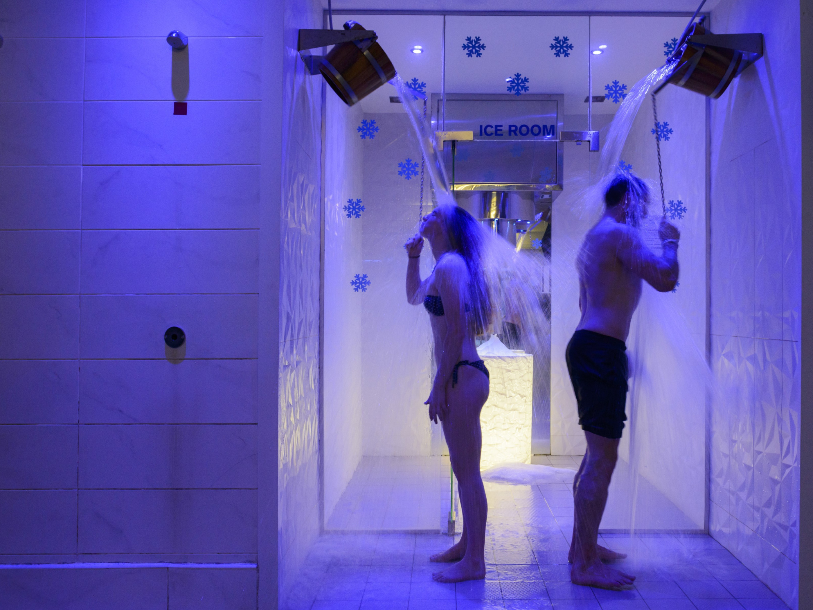 Man and woman in ice room at West Wood Club