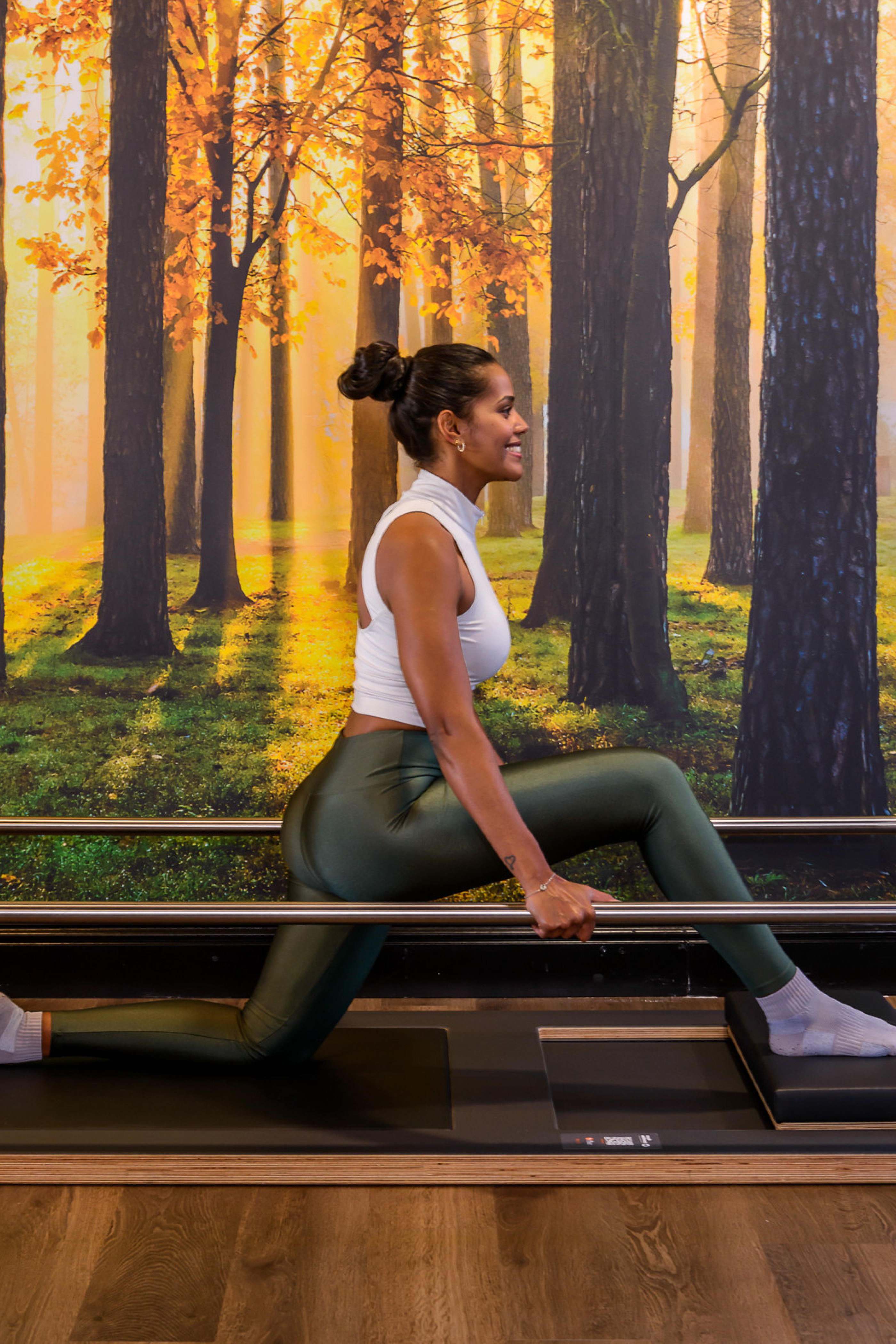 Young girl practising flexibility and posture exercises in the medical fitness studio at West Wood Club Dublin