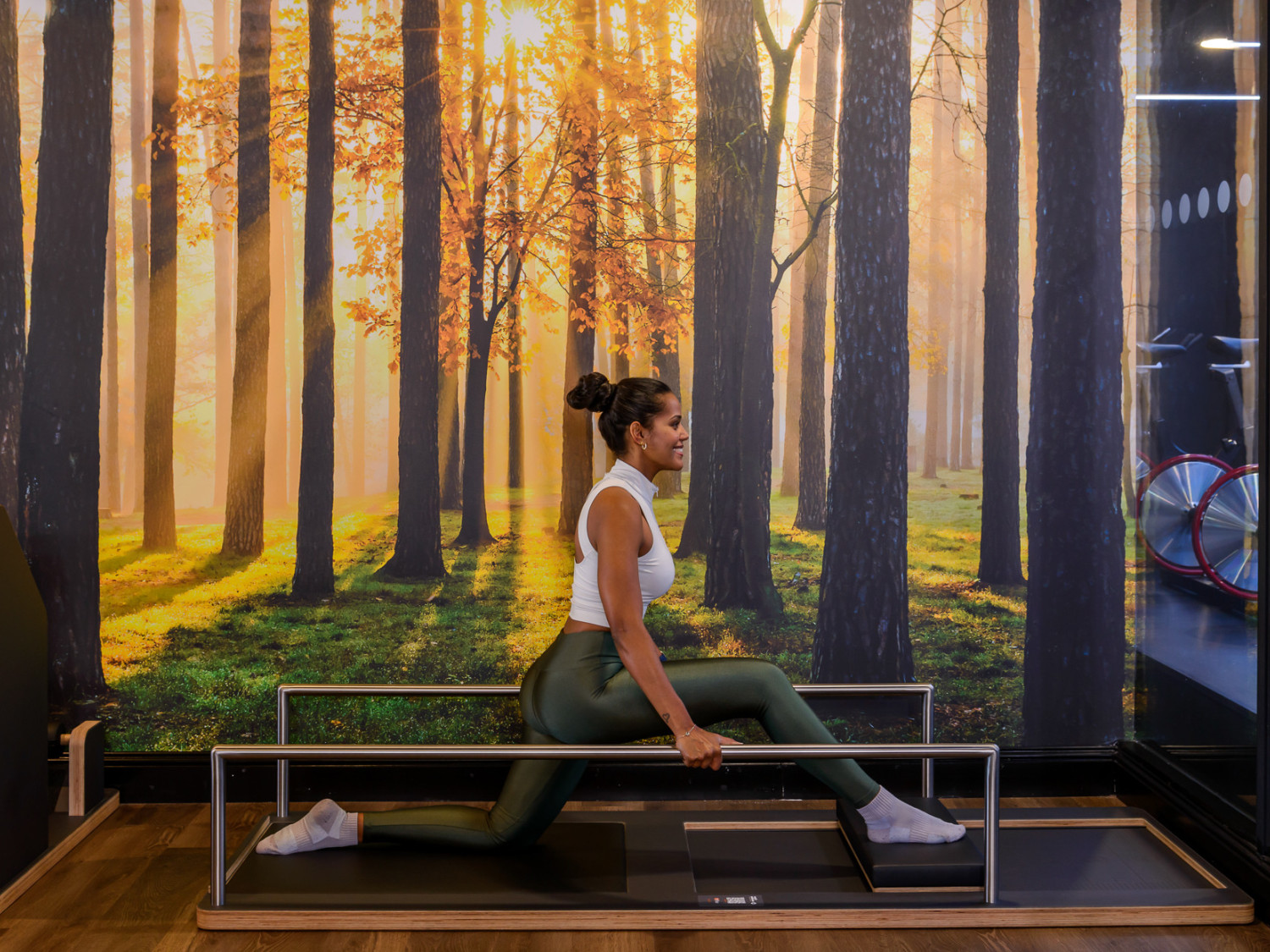 Young girl practising flexibility and posture exercises in the medical fitness studio at West Wood Club Dublin