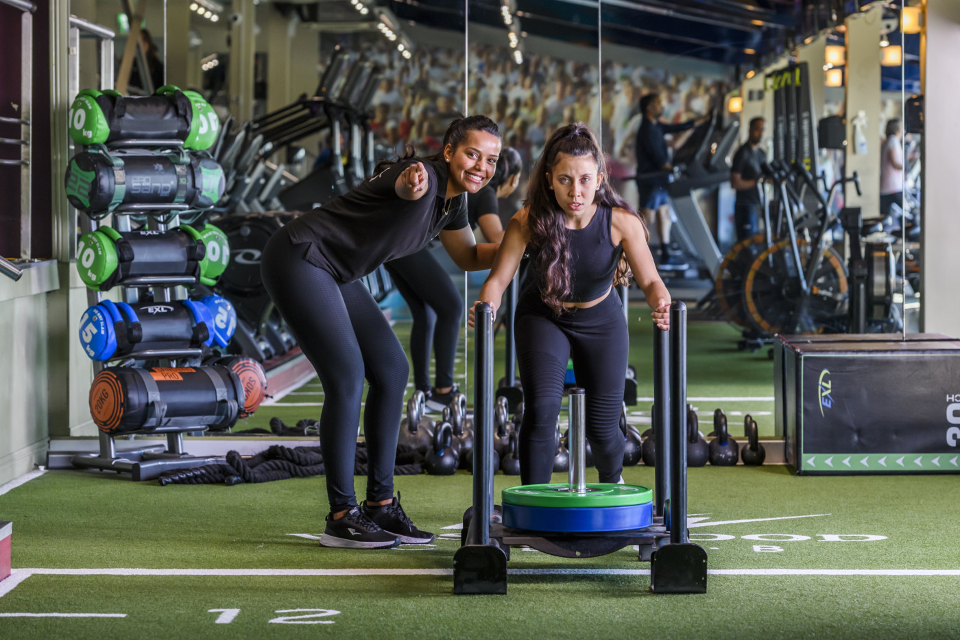 PERSONAL TRAINER WITH CLIENT AT PERSONAL TRAINING STUDIO IN DUBLIN